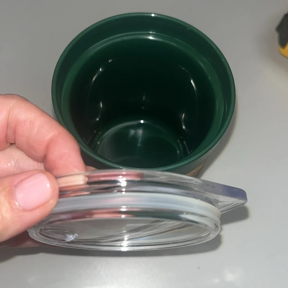 Jagermeister cork, plastic cup cooler with lid small green in color